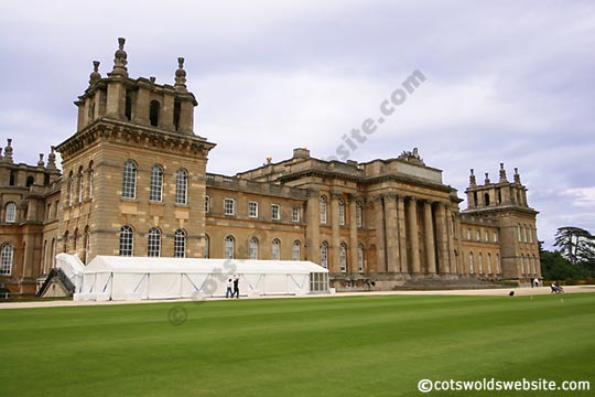 A view of Blenheim Palace. We think that the white marquee  is used to keep guests dry when raining. Possibly during the transfer of guests from one part to another. Image copyright CotswoldsWebsite.com